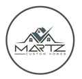 Logo for Martz Custom Homes: stylized houses with checkmark and text within a circle.