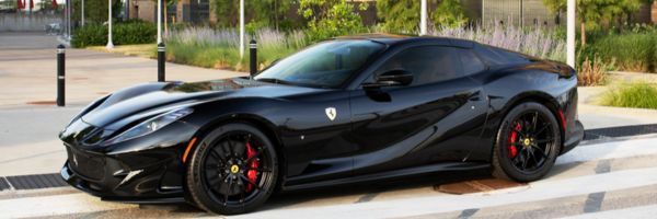 Black vehicle with matched factory window tint for a clean custom look.