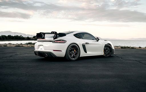 White Porsche protected with Llumar Llumar Valor paint protection film... glossy self-healing film.