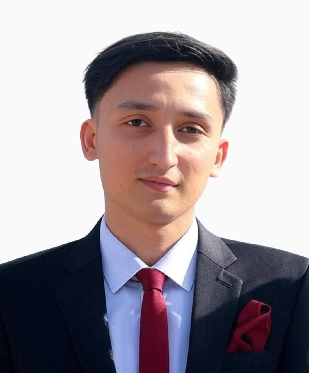 A man with a beard is wearing a blue shirt and tie.