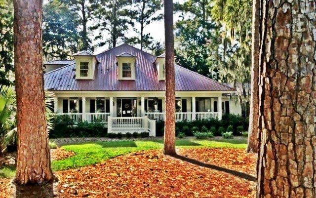 Residential Roofing Contractor — Beautiful House with Metal Roof in Savannah, GA