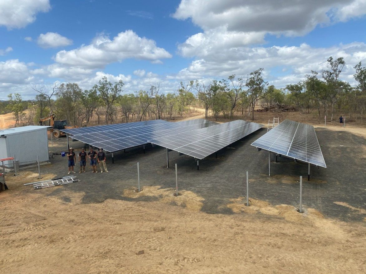 Solar Panels On Sandy Field — Mission Solar And Electrical In Mission Beach, QLD