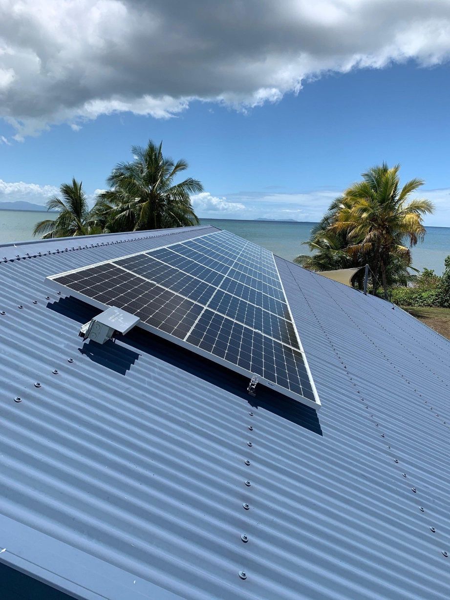 Solar Panels On Roof With View Of Beach — Solar Power In Cassowary Coast, QLD