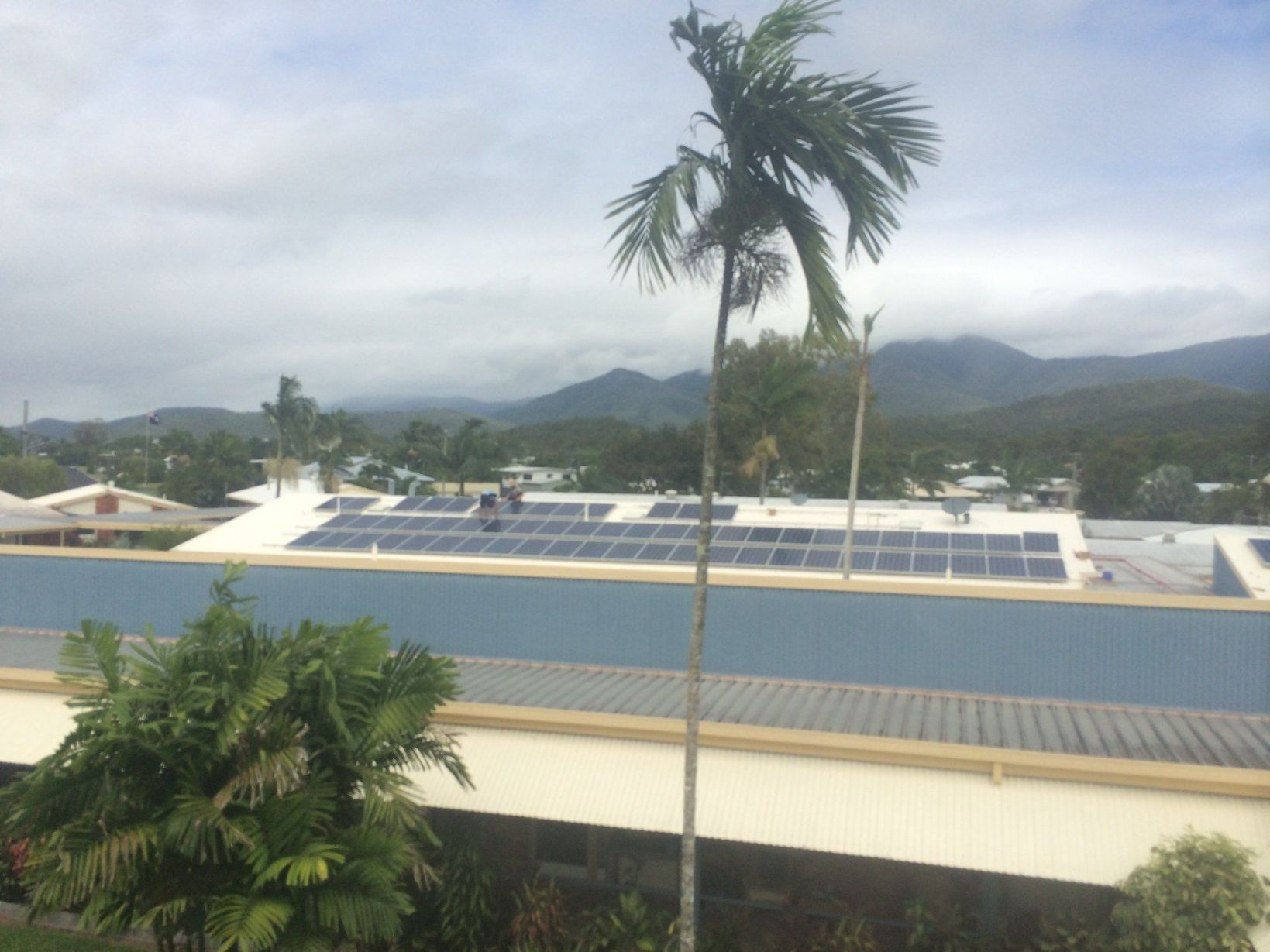 Solar Panels Being Installed On School Building — Mission Solar And Electrical In Mission Beach, QLD