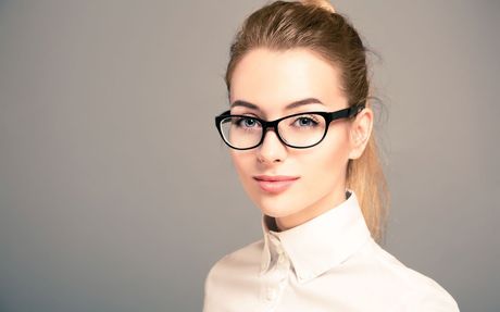 woman in black frame glasses