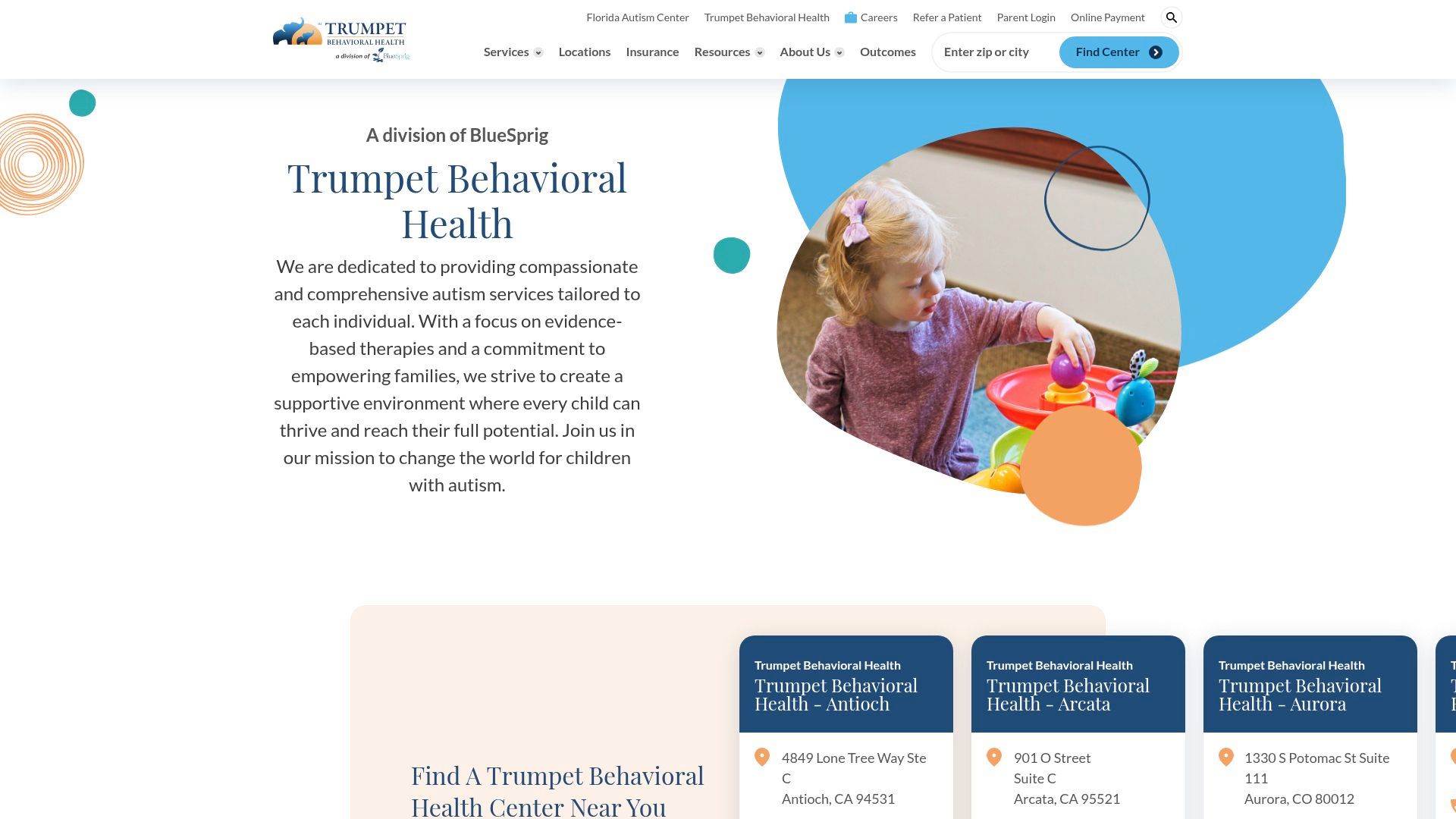 Trumpet Behavioral Health website homepage. Child playing with colorful toys, blue and orange accents.