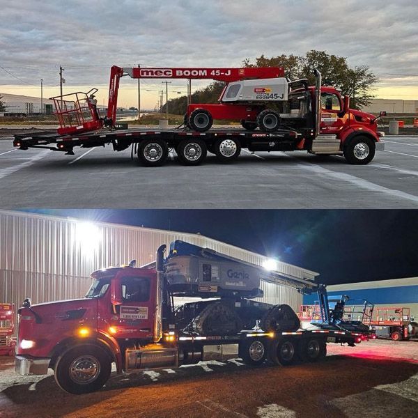 A red tow truck with a crane on the back of it