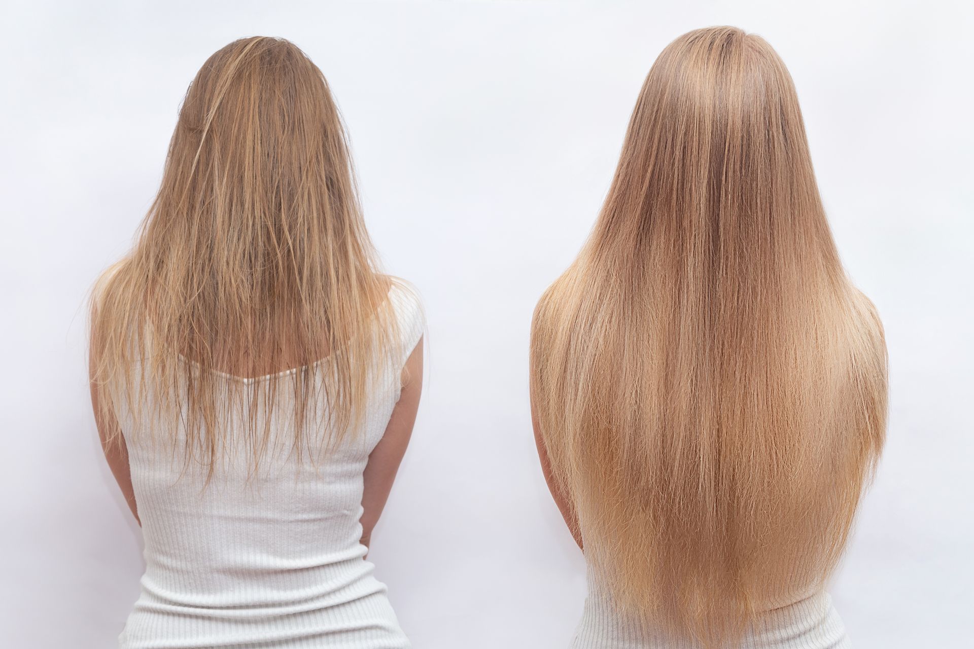 Two women from the back with long blonde hair, one in a white dress.
