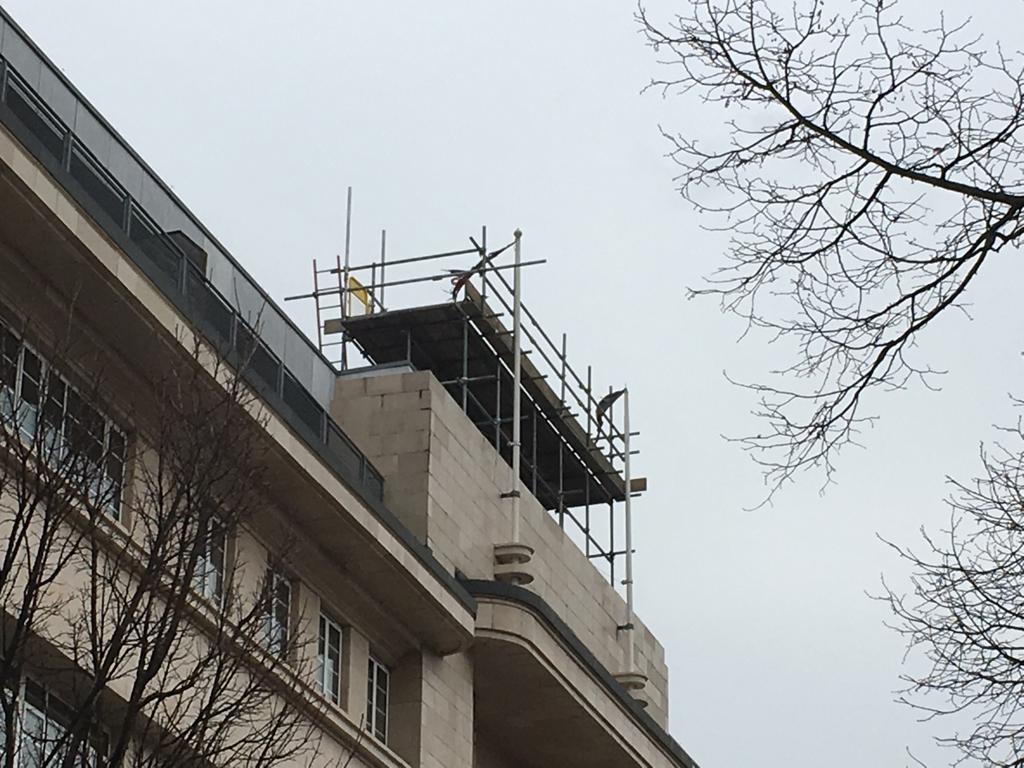 Scaffolding platform to access flagpoles for cleaning and repairs