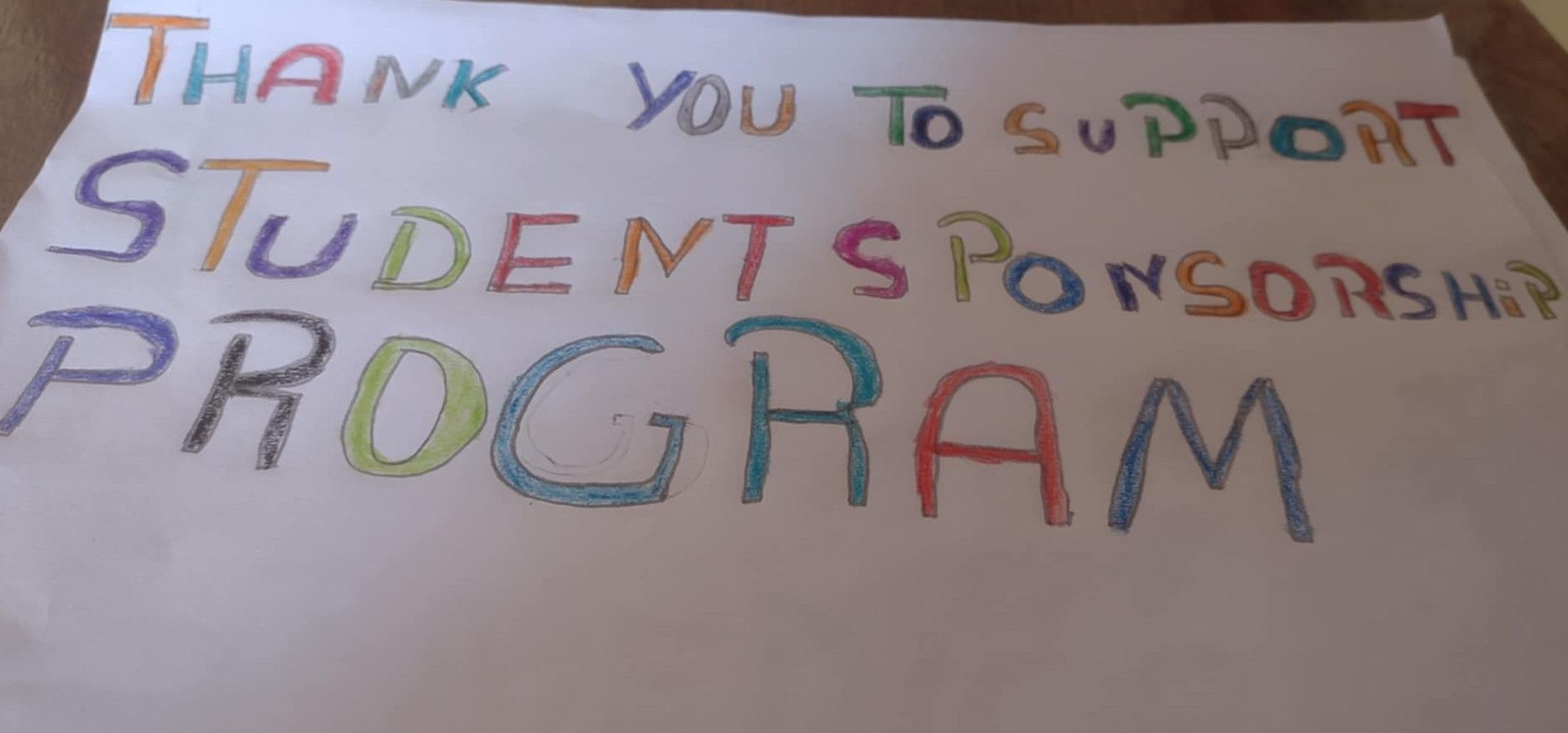 A student's letter drawing that says 