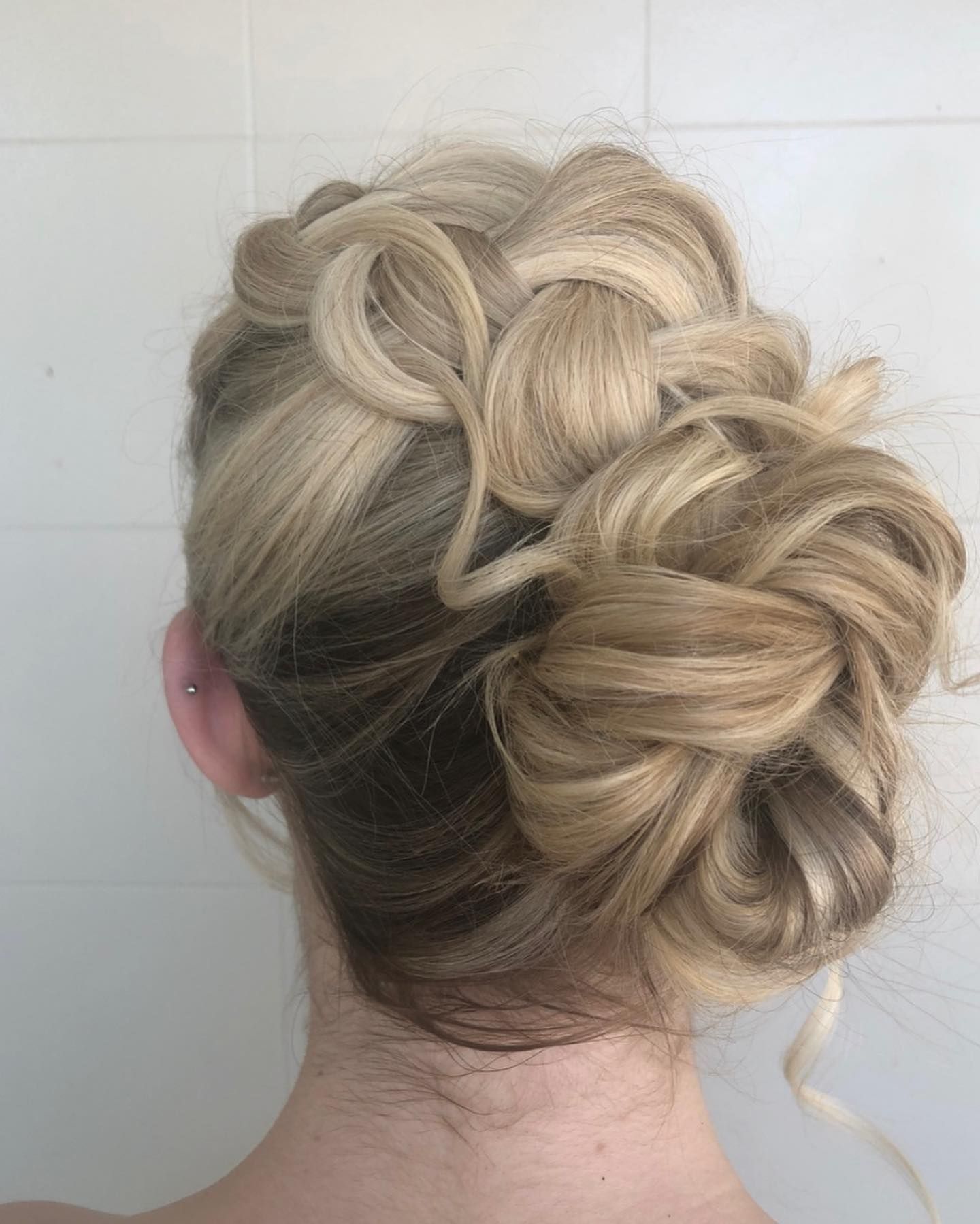 A Woman Is Getting Her Hair Done By A Hairdresser — Carlee Hair Design In Anula, NT