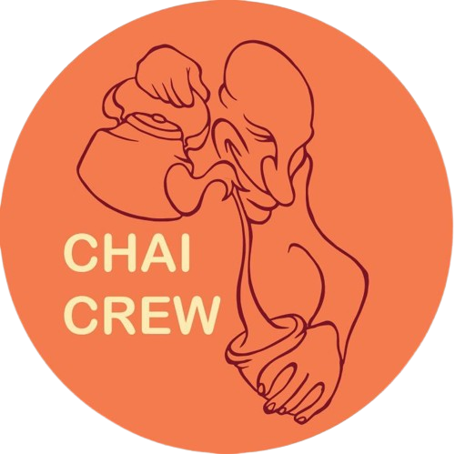 Orange logo: Cartoon of a man pouring tea from a kettle into a cup. Text 