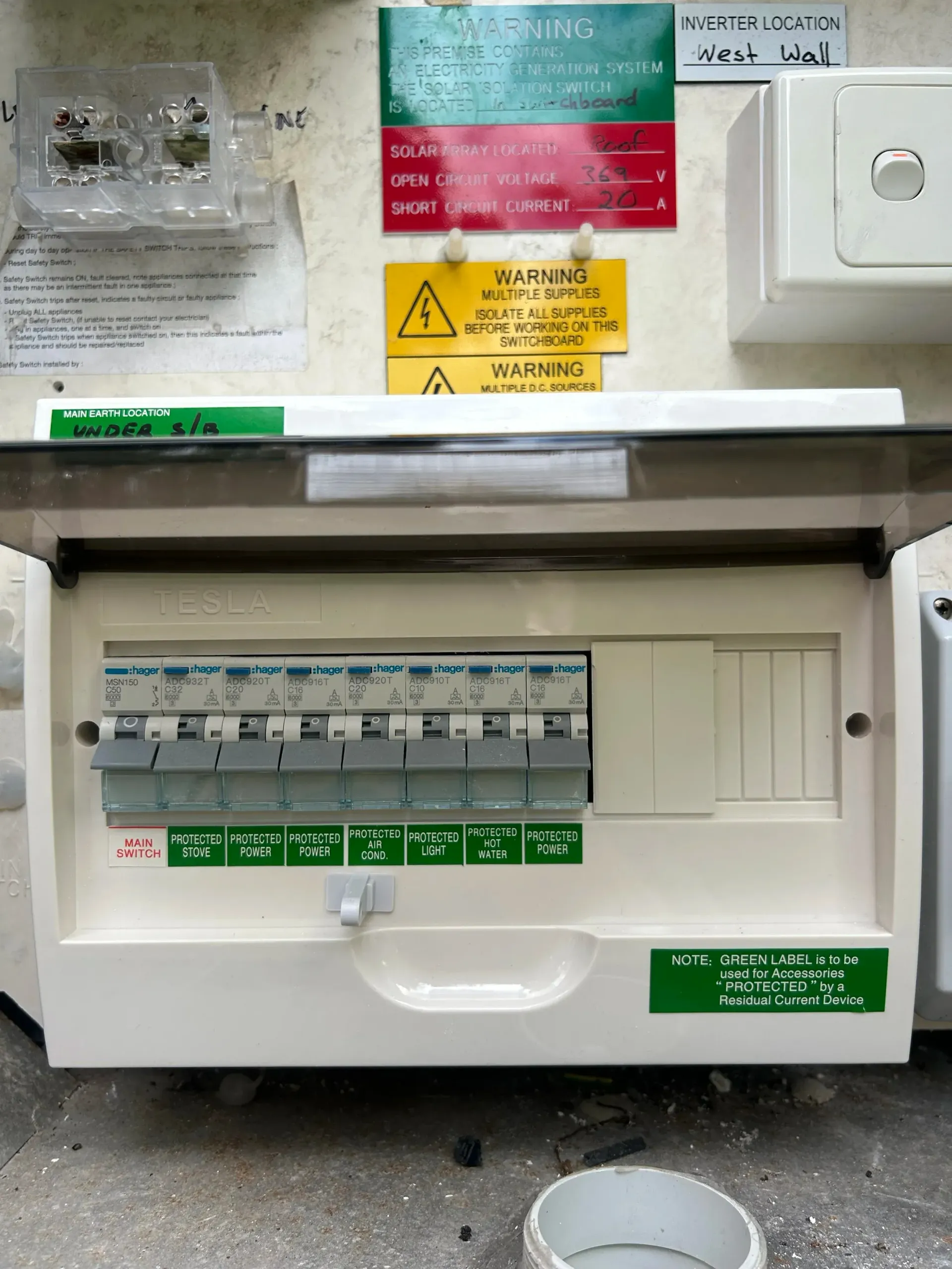 An Open Electrical Consumer Unit With Circuit Breakers — BTM Electrical & Air in Elanora, QLD