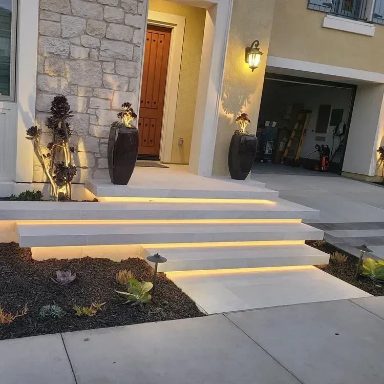 Lighted Stone Steps Leading to a Front Entryway — BTM Electrical & Air in Elanora, QLD