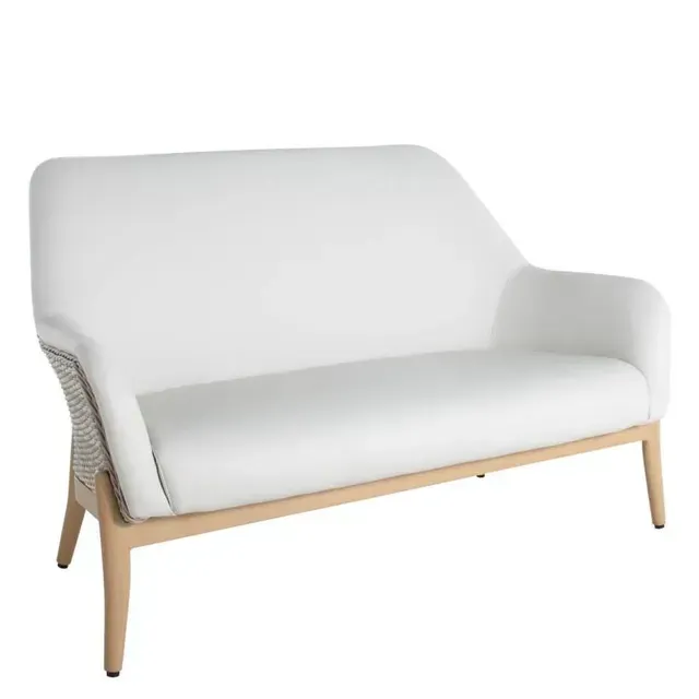 White loveseat with light wood frame, woven side panels, and neutral tones.