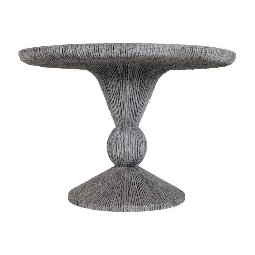 Gray woven pedestal table with round top.