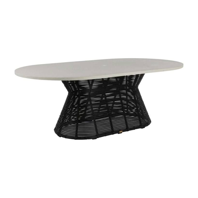 Oval outdoor dining table with a light gray top and black woven base.