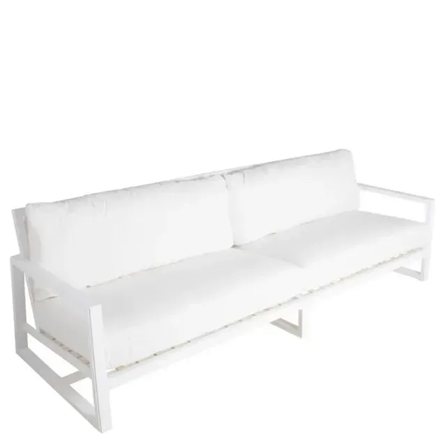 White outdoor sofa with white cushions and a rectangular metal frame.