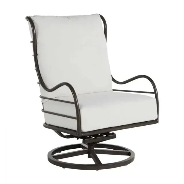 Outdoor swivel chair with white cushions and dark metal frame.