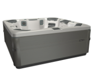 A gray hot tub with a white interior, set against a white background.