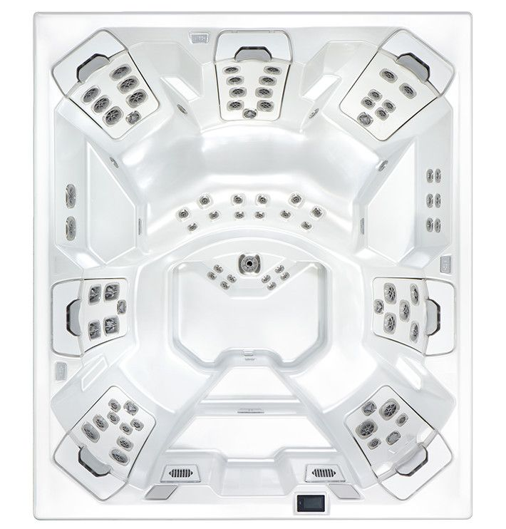 White hot tub with many jets and seating areas.