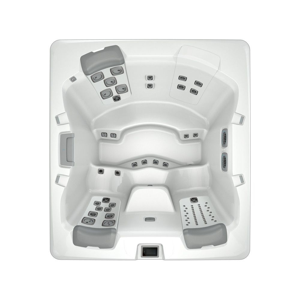 Overhead view of a square, white hot tub with grey headrests, jets, and controls.