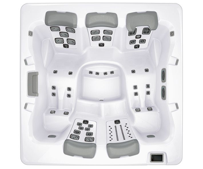 Top-down view of a white hot tub with six seating areas and gray headrests.