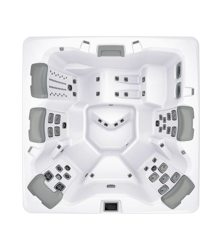 Top-down view of a white hot tub with gray seats, multiple jets, and built-in steps.