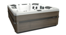 Hot tub with gray-brown wood-like siding, white interior, and control panel.