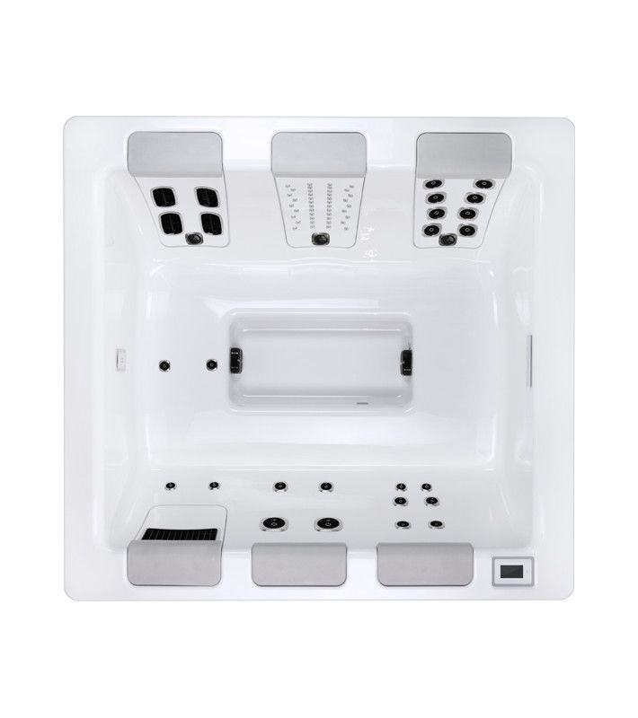 Overhead view of a white rectangular hot tub with multiple jet zones and seating.