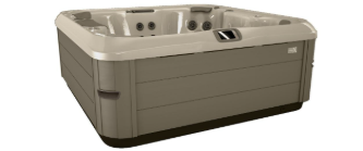 A large, square hot tub with a tan rim and gray exterior.