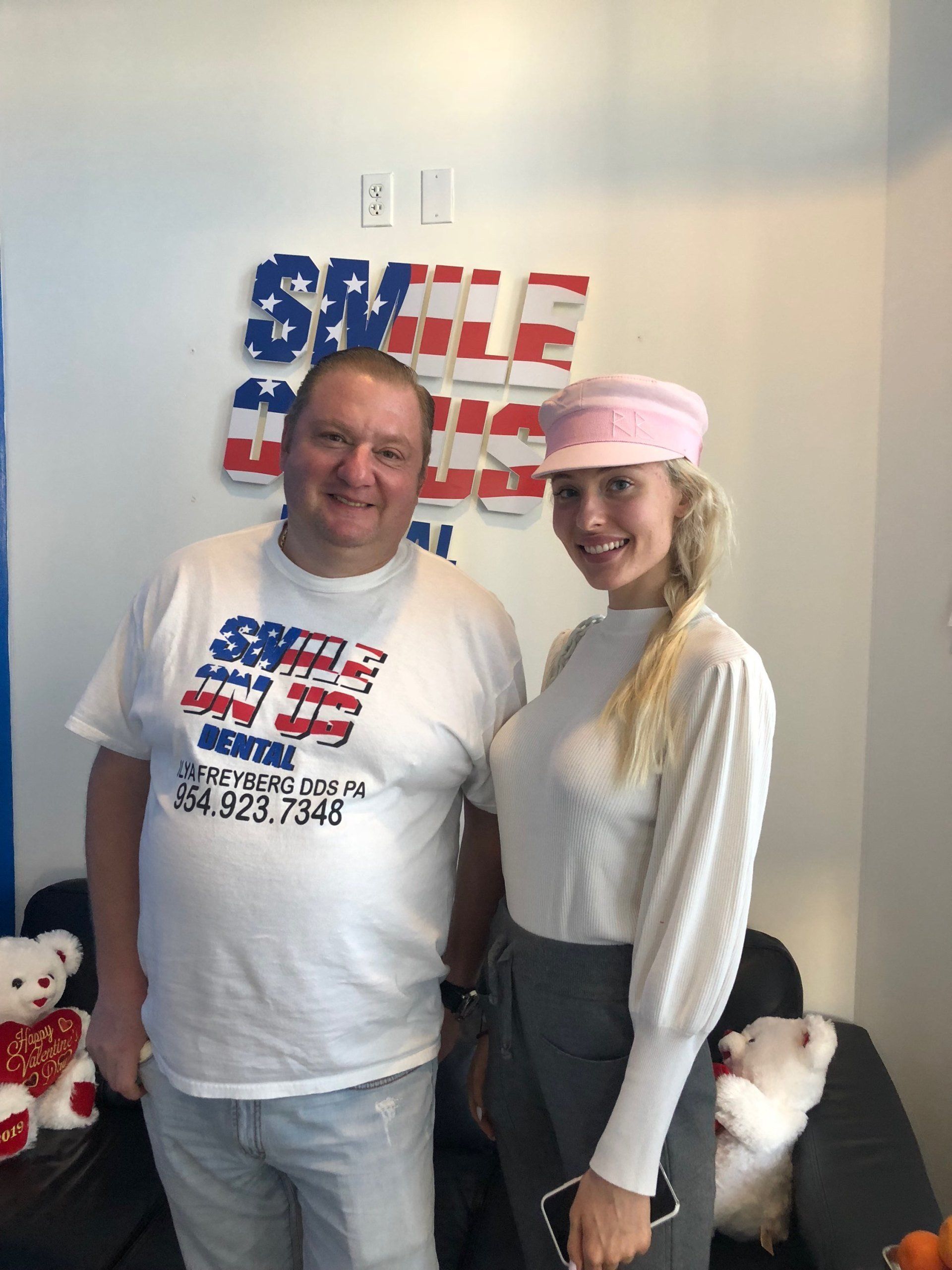 Dr. Illya Freyberg  posing with a french girl