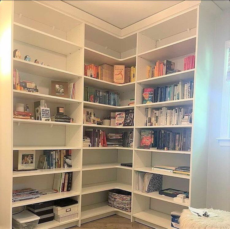 There are many books on the shelves in this room.