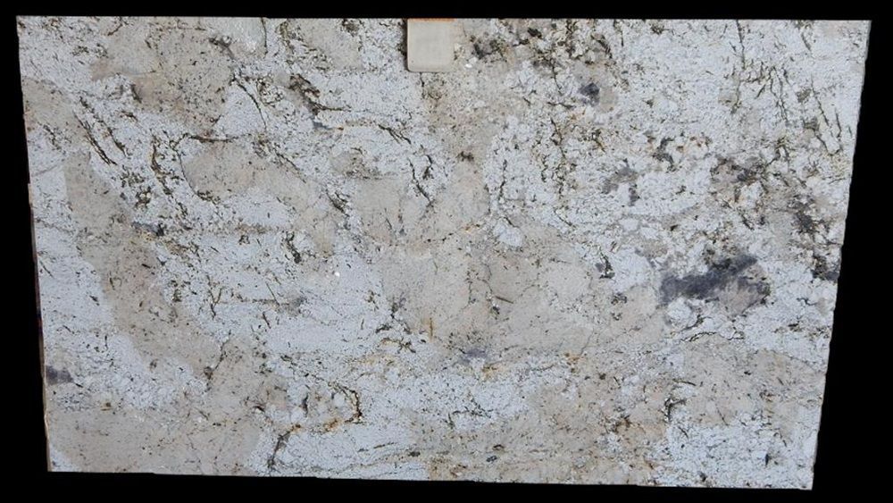 A black canvas is sitting on top of a black easel.