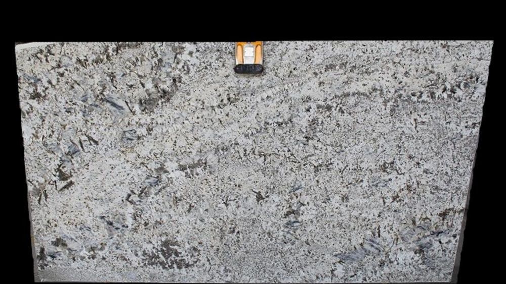 A close up of a granite slab on a black background.