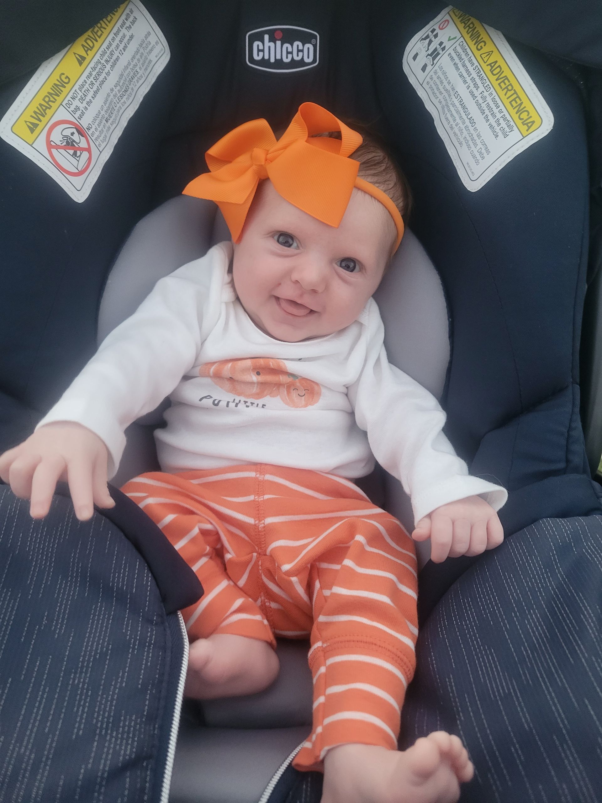 A Baby Wearing An Orange Ribbon - Chattanooga, TN - Innovative Women's Health Specialists