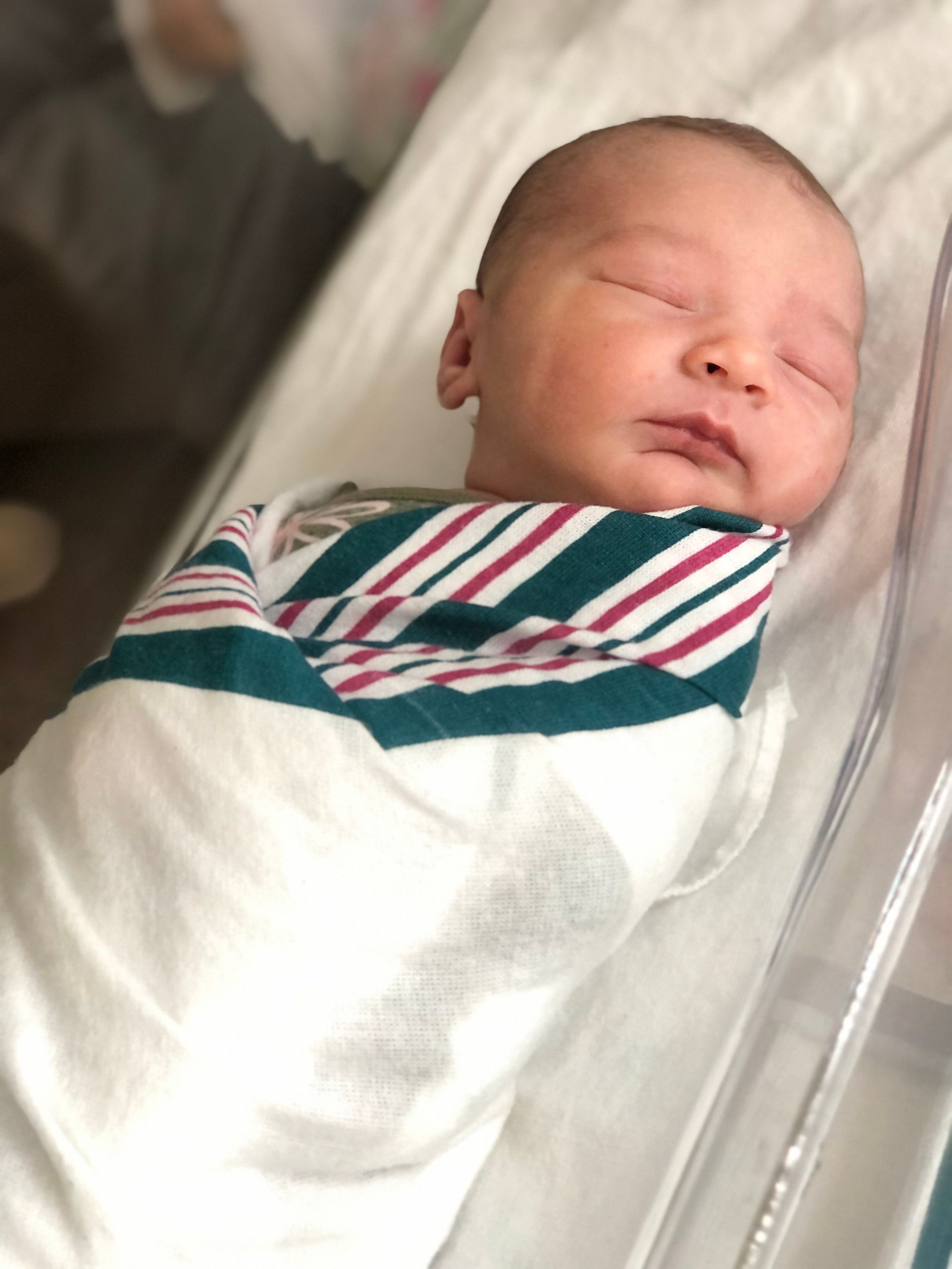 New Born In A Striped Blanket | Chattanooga, TN | Innovative Women's Health Specialists