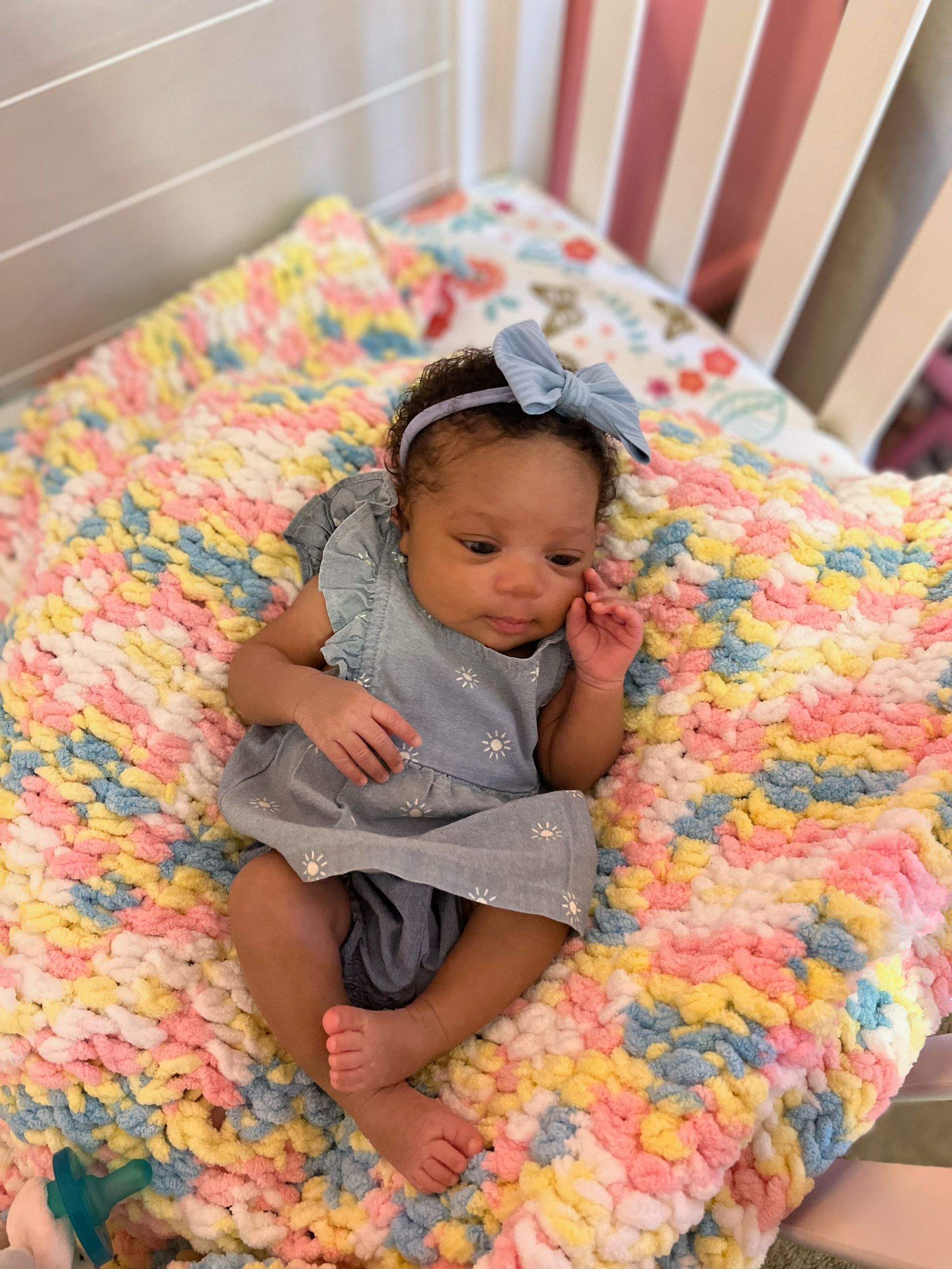 New Born In A Colorful Bed | Chattanooga, TN | Innovative Women's Health Specialists