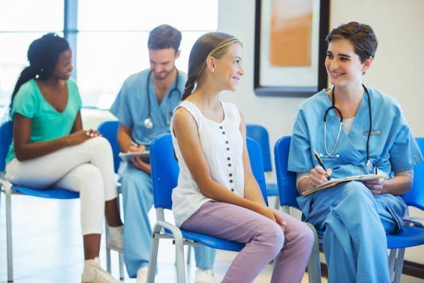 Urgent care clinic with smiling patients and nurses.