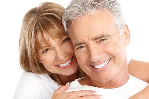 couple smiling with perfect teeth