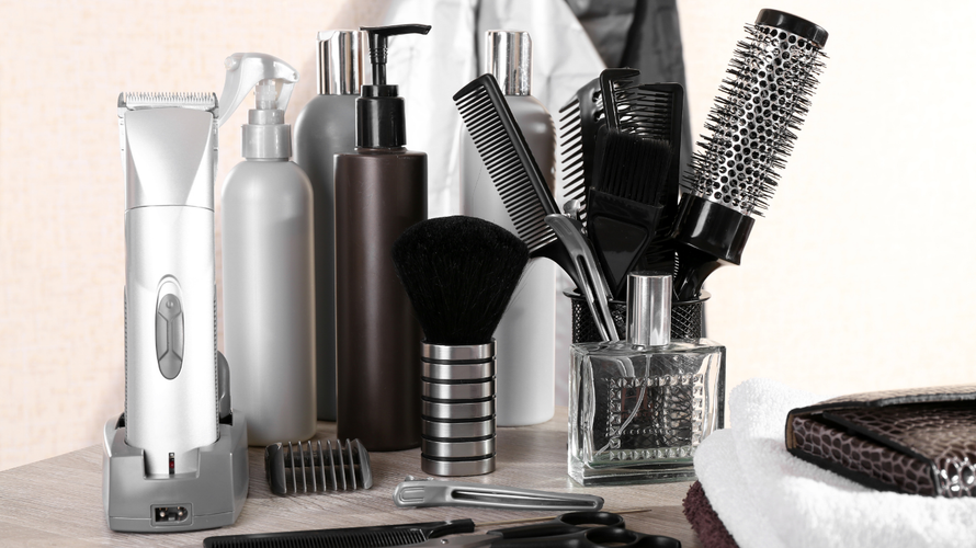 A table with a bunch of hair products on it