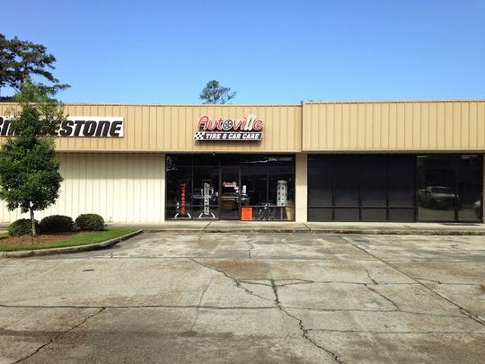 A building with a sign that says autovise on it