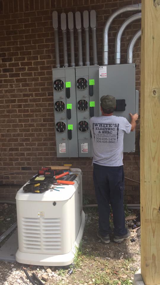 Generators — Technician Checking the Control Panel in Williamson, WV