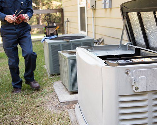 Technician Repairing Air Conditioner — Greenwood, SC — Hughes Heating & Cooling