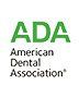 The logo for the american dental association is green and black.