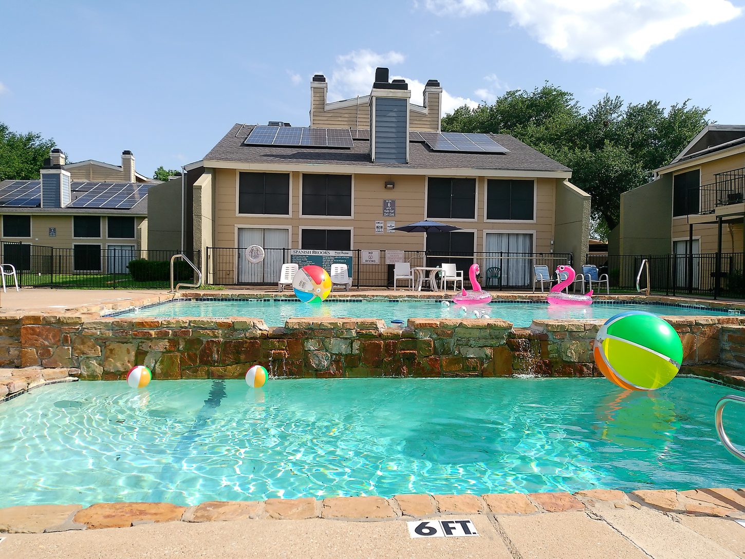 A large swimming pool with a 6 ft depth limit