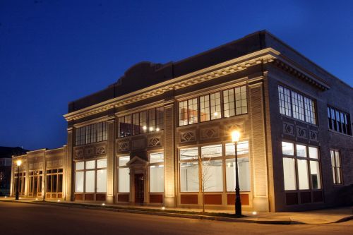 Man installing smoke or carbon monoxide detector — Saint Louis, MO — Southwestern Electric Company Inc.
