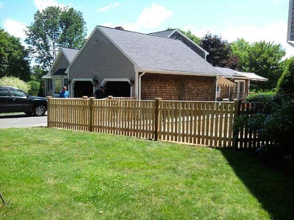 House with wooden fence — garden fencing in Bridgewater, MA
