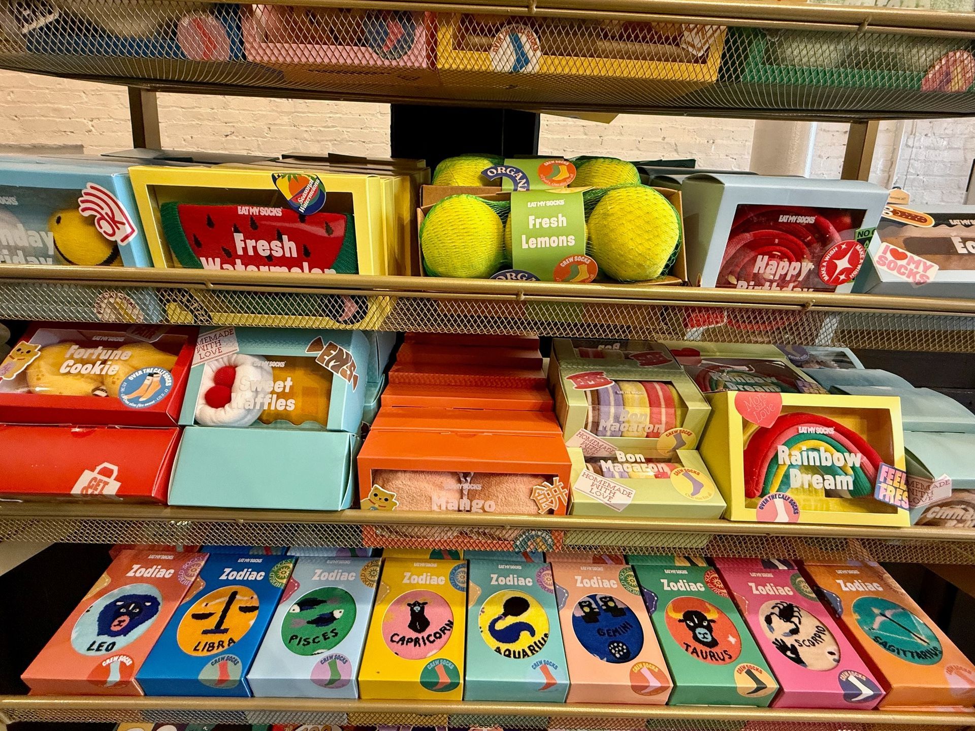 A shelf filled with lots of different types of candy.