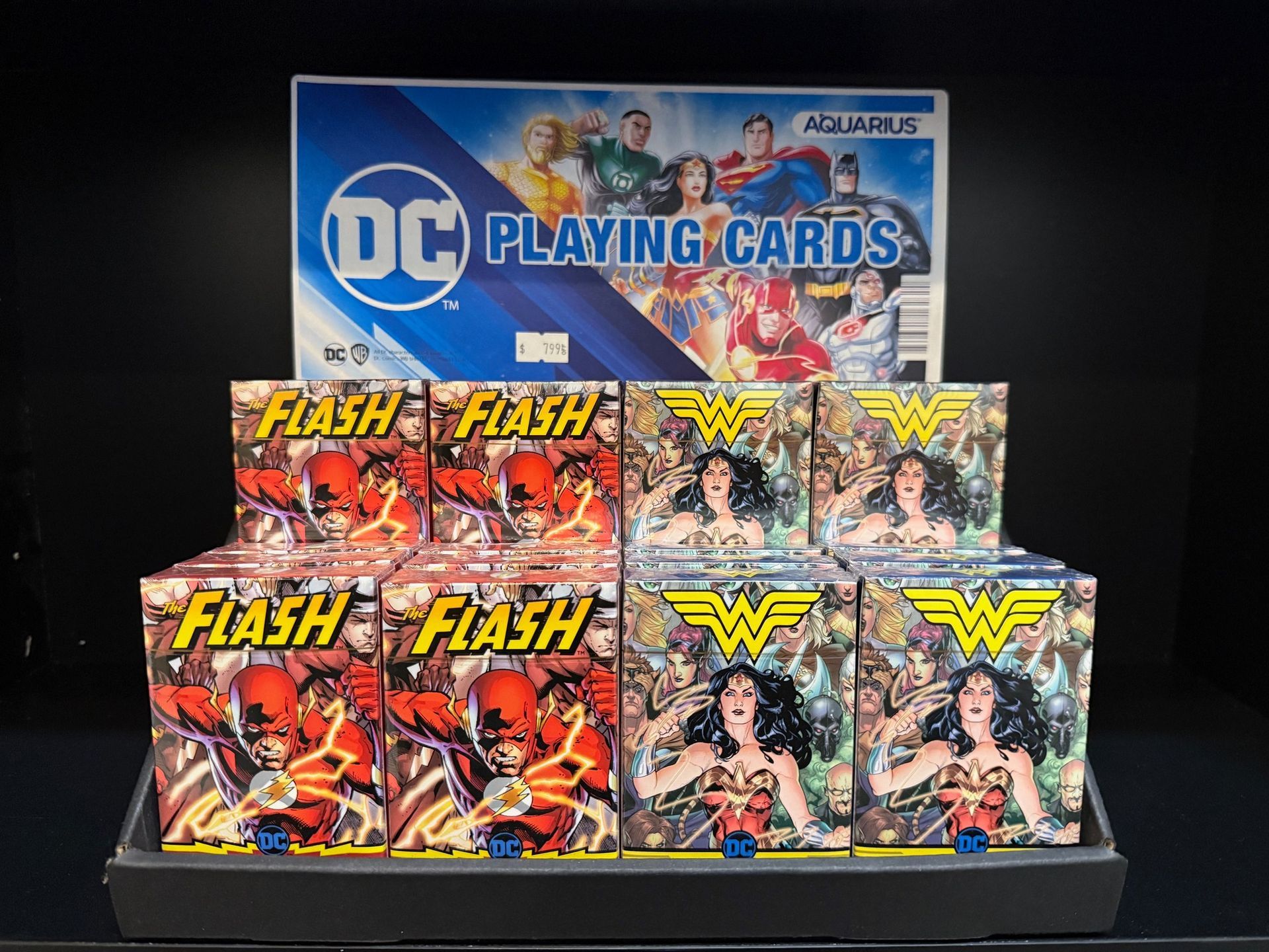 A display of flash and wonder woman playing cards